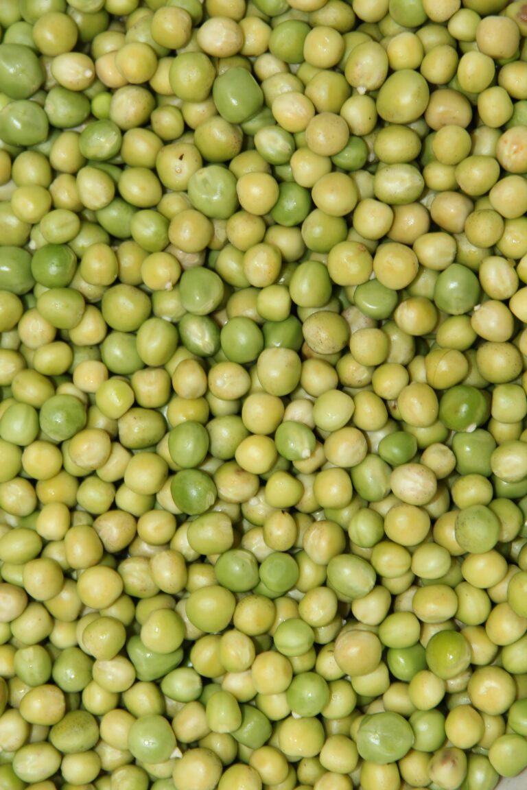 Captivating close-up of a fresh green peas texture, ideal for food backgrounds.